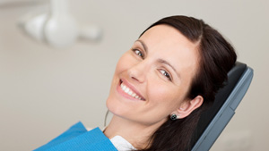 Patient in Toronto smiling after restorative dental treatment at Dentistry Asleep