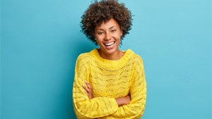 a woman smiling with veneers in Toronto