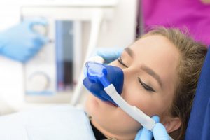 woman relaxed receiving sedation dentistry