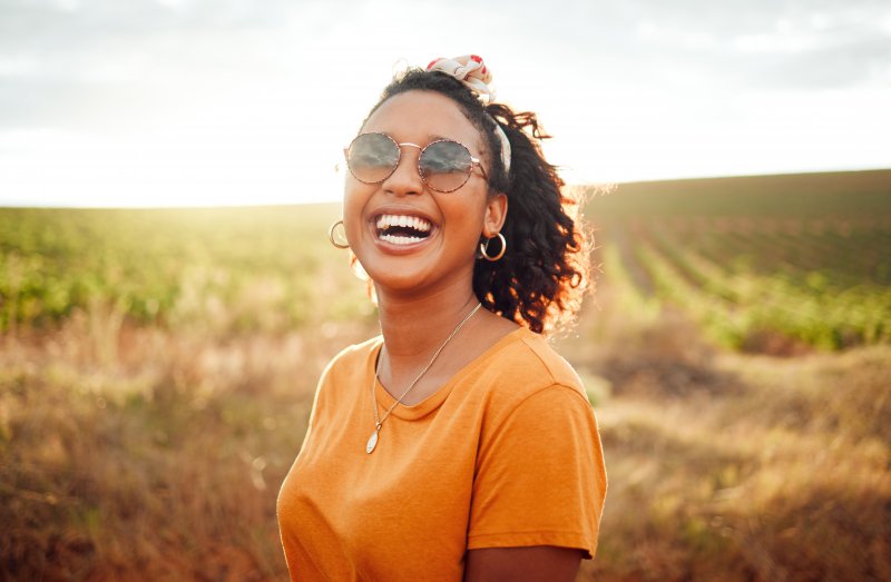 young person with a perfectly white smile